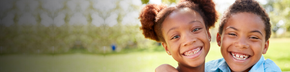 Two children smiling